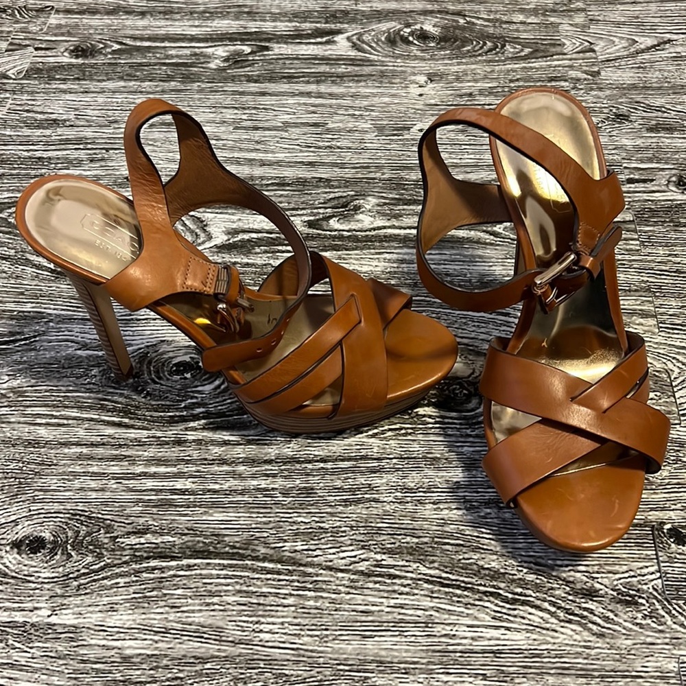 Brand new, never worn Coach heeled sandals